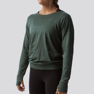 Green long sleeved running shirt with thumb holes, for ladies.