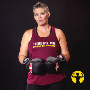 Julie Bateman (model) is the founder of Asskicker Activewear and runs the company in her home office, located in Barrie, Ontario Canada.