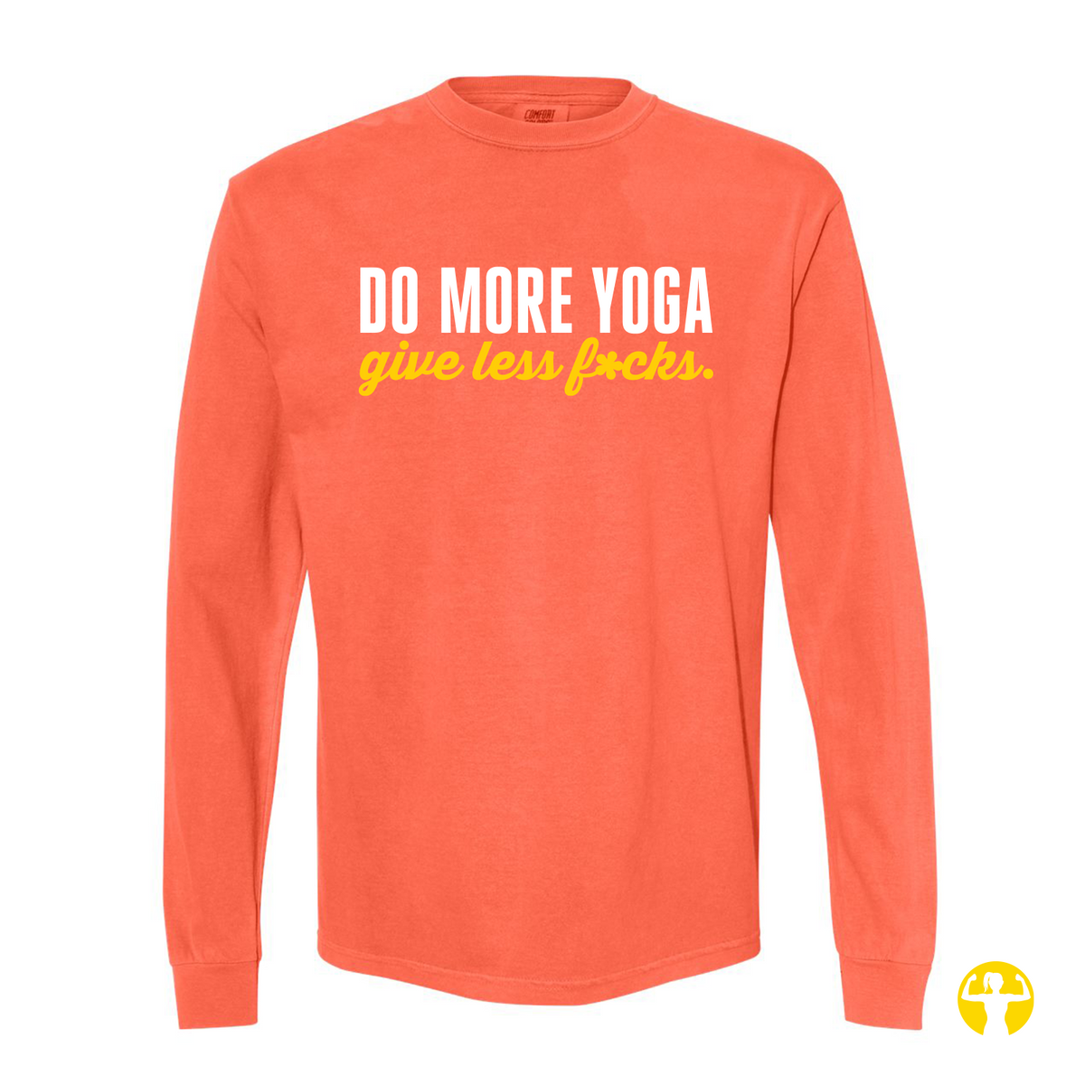 Flat lay view of a Neon Red Orange Comfort Colors garment-dyed long sleeve shirt featuring the text 'Do More Yoga, Give Less F*cks' printed across the chest in bold white block lettering and stylized bright yellow script, displayed against a clean light beige background.