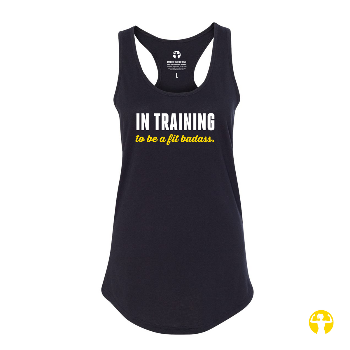 A black racerback tank top with the text In Training to be a Fit Badass' printed on the front in white and yellow, displayed on a solid white background.