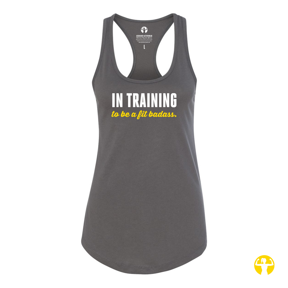A dark gray racerback tank top with the text 'IN TRAINING' in white and 'to be a fit badass.' in yellow, displayed on a solid white background.