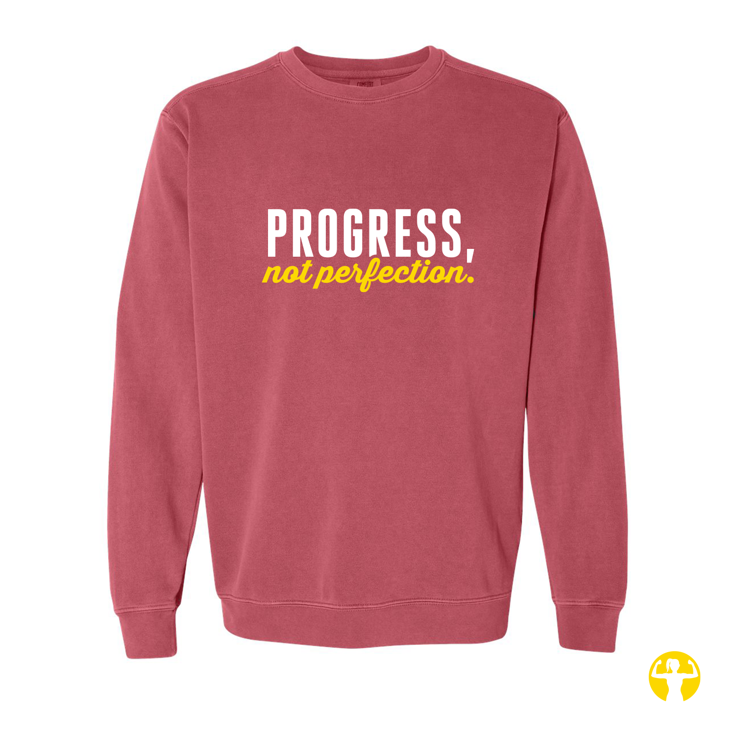 A dusty rose crewneck sweatshirt featuring the text 'PROGRESS, not perfection.' printed on the chest in white and yellow, displayed against a solid white background.