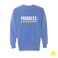 A blue crewneck sweatshirt with the text 'PROGRESS, not perfection.' printed on the chest in white and yellow, shown against a plain white background.