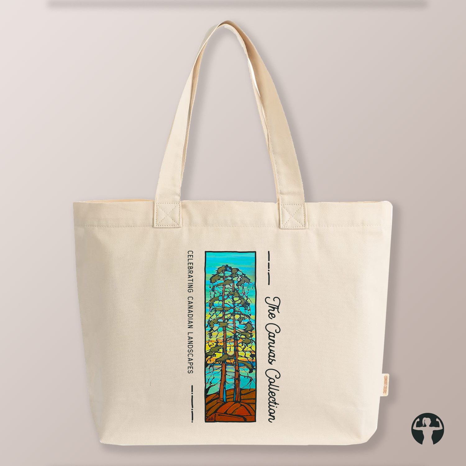 An off-white canvas tote bag with dual shoulder straps, featuring a colorful graphic print of a pine tree and the text 'The Canvas Collection' and 'Celebrating Canadian Landscapes' on a neutral beige background.