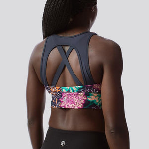 X-Factor Sports Bra in a beautiful  purple, pink and teal floral pattern. Born Primitive sports bras are available online from Asskicker Activewear in Canada.