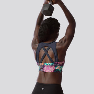 X-Factor Sports Bra in a beautiful  purple, pink and teal floral pattern. Born Primitive sports bras are available online from Asskicker Activewear in Canada.