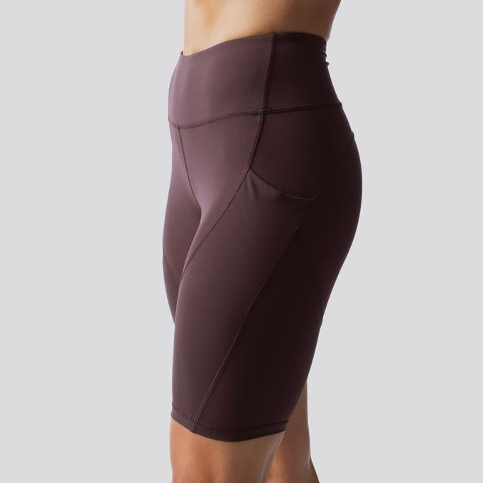 The Cadence Pocket Short from Born Primitive (Plum)