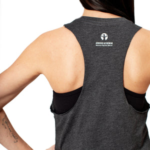 Back view of a deep heather grey cropped racerback tank top with the Asskicker Activewear Logo printed in white.