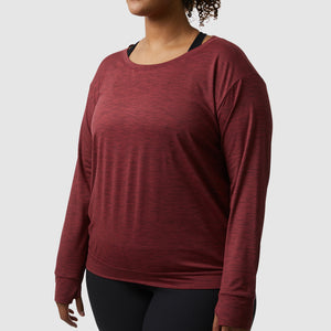 Maroon long sleeved yoga shirt with thumb holes, available in plus sizes for curvy women. We're proud to carry body positive sizes from Born Primitive.